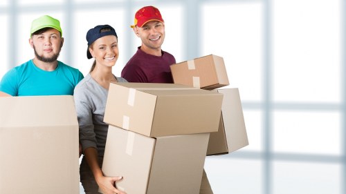 Stacked boxes and labeled containers in a clean storage setting