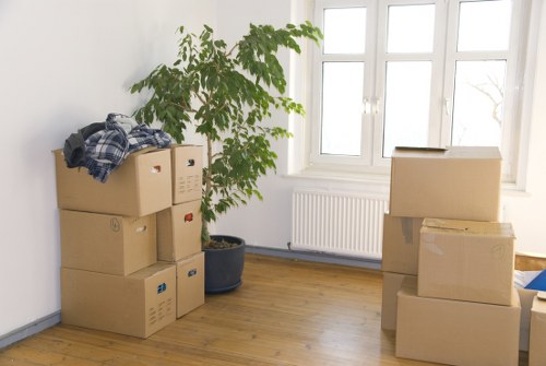 Professional man and van loading items in Oldford